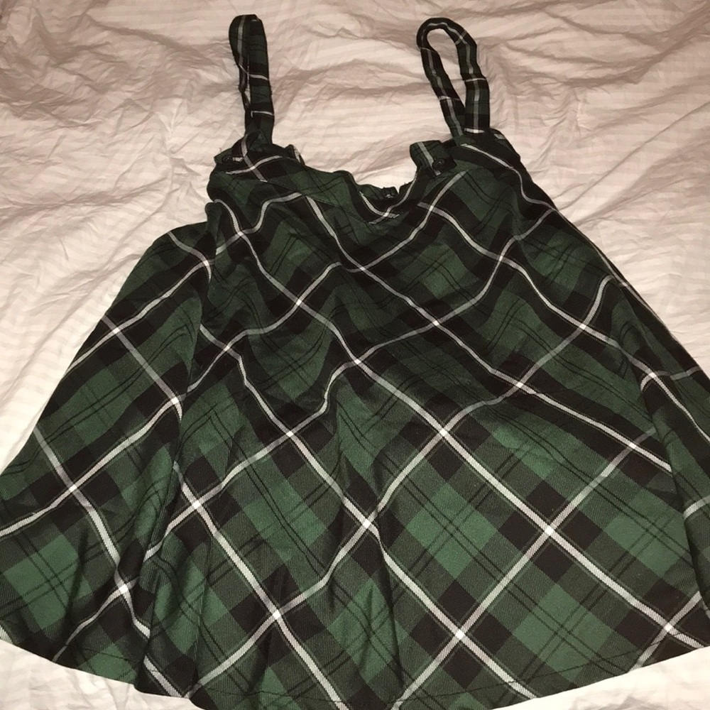 A plus size plaid suspender skirt.